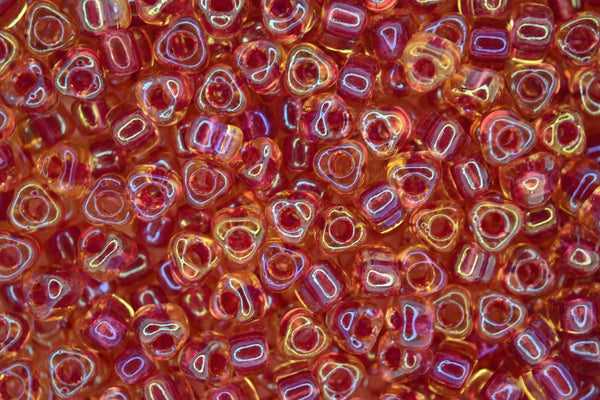 10g MIYUKI 5/0 Triangle Japanese Seed Beads 5mm 1163 Light Cranberry Lined Topaz Luster