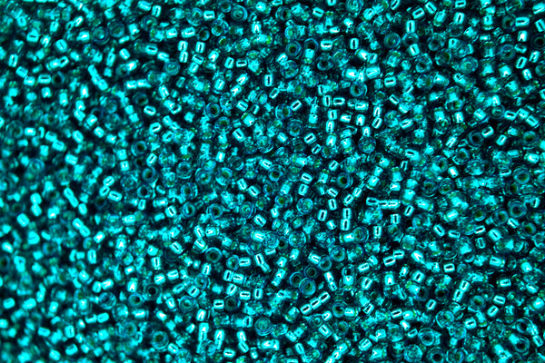 10g MIYUKI 15/0 Runde japanische Rocailles 1,5mm 91424 Silber gefüttert Blaugrün