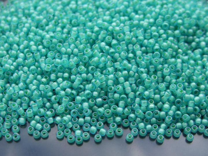 10g TOHO 11/0 Round Japanese Seed Beads 2mm 954F Inside Color Frosted Aquamarine/Light Jonquil Lined Beadacious