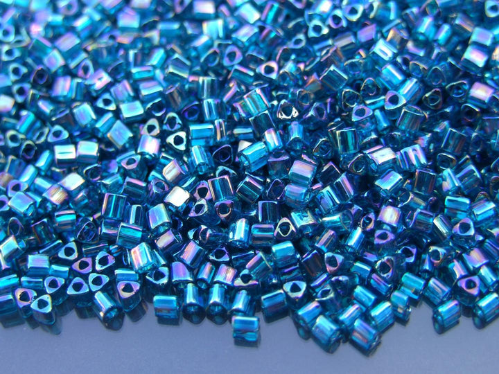 10g TOHO 11/0 Triangle Japanese Seed Beads 2mm 167BD Transparent Teal Rainbow Beadacious