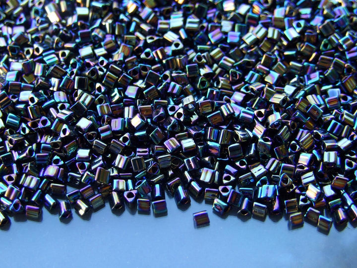 10g TOHO 11/0 Triangle Japanese Seed Beads 2mm 86 Metallic Iris Rainbow Beadacious