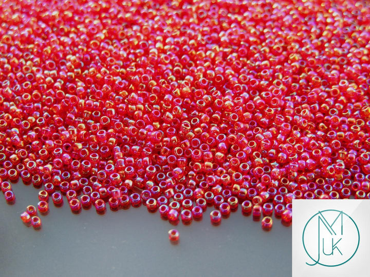 10g TOHO 15/0 Round Japanese Seed Beads 1.5mm 165C Transparent Ruby Rainbow Beadacious