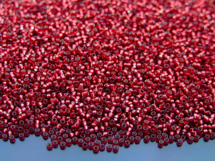 10g TOHO 15/0 Round Japanese Seed Beads 1.5mm 2113 Silver Lined Milky Pomegranate Beadacious