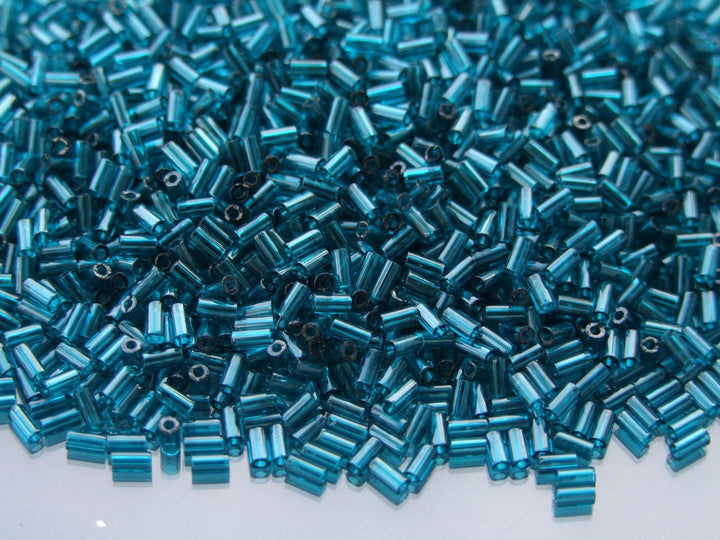 10g TOHO 3mm Bugle Japanese Seed Beads 7BD Transparent Capri Blue Beadacious