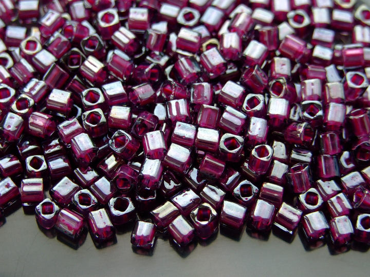 10g TOHO 4mm Cube Japanese Seed Beads 1076 Inside Color Grey/Magenta Lined Beadacious