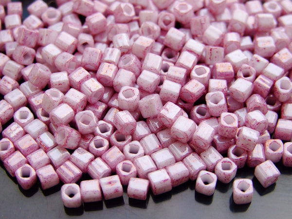 10g TOHO 4mm Cube Japanese Seed Beads 1200 Marbled Opaque White Pink Beadacious