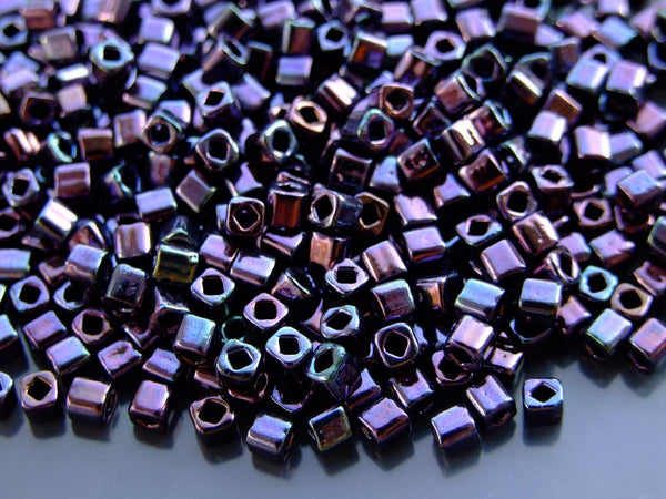 10g TOHO 4mm Cube Japanese Seed Beads 90 Metallic Amethyst Gunmetal Beadacious