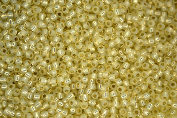 10g TOHO 11/0 Round Japanese Seed Beads 2mm 2125 Silver Lined Milky Light Jonquil