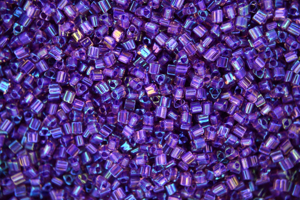 10g TOHO 11/0 Triangle Japanese Seed Beads 2mm 928 Inside Color Rainbow Rosaline/Purple Lined