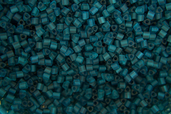 10g TOHO 11/0 Triangle Japanese Seed Beads 2mm 7BDF Transparent Frosted Teal