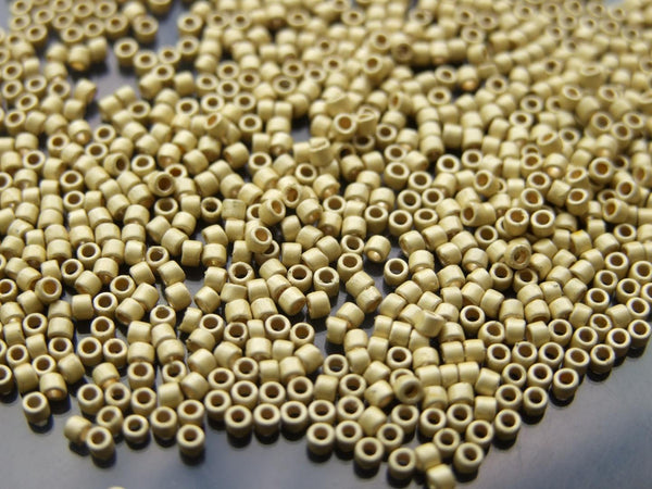 7g TOHO 11/0 Treasure Japanese Seed Beads 1.8mm PF559F PermaFinish Galvanized Matte Yellow Gold Beadacious