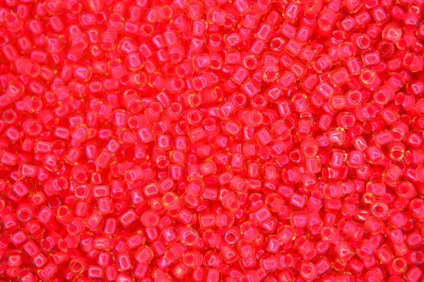 10g TOHO 11/0 Round Japanese Seed Beads 2mm 979 Luminous Light Topaz Neon Pink Lined