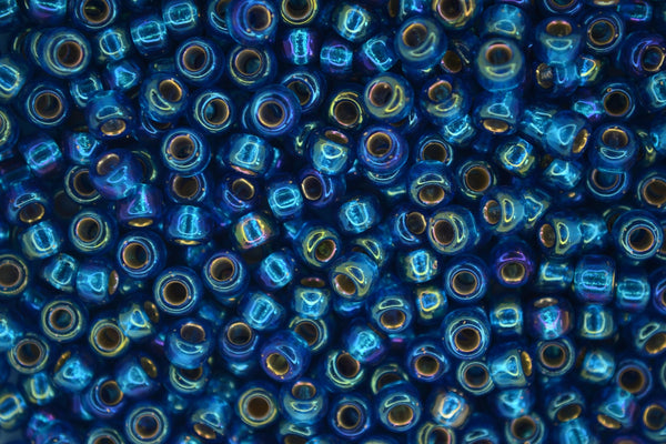 10g MIYUKI 6/0 Round Japanese Seed Beads 4mm 91025 Silver Lined Capri Blue AB