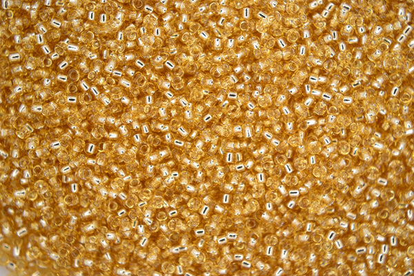 10g TOHO 15/0 Round Japanese Seed Beads 1.5mm 22 Silver Lined Light Topaz