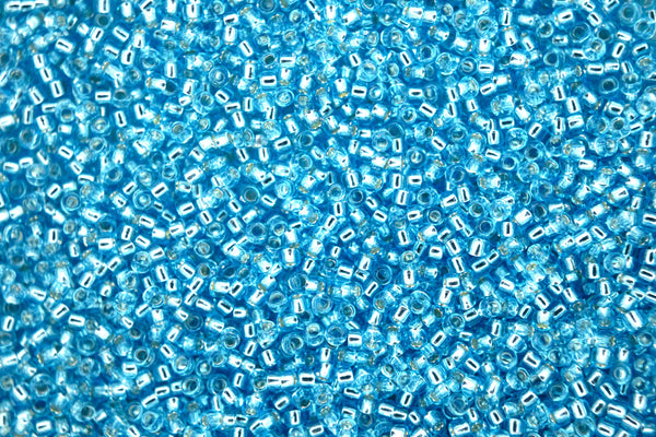 10g TOHO 15/0 Runde japanische Rocailles 1,5mm 23 Silber gefüttert Aquamarin