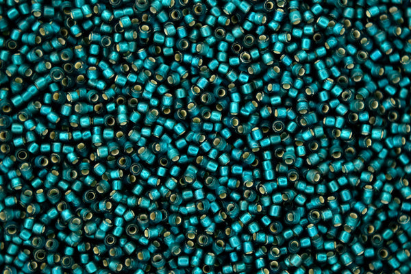 10g TOHO 15/0 Round Japanese Seed Beads 1.5mm 27BDF Silver Lined Frosted Teal