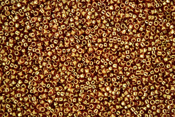 10g TOHO 15/0 Round Japanese Seed Beads 1.5mm 421 Gold Luster Transparent Pink