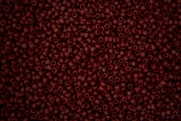 10g TOHO 15/0 Round Japanese Seed Beads 1.5mm 46F Opaque Frosted Oxblood