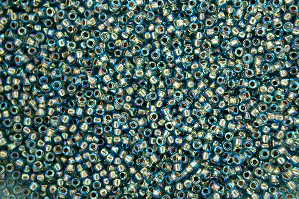 10g TOHO 15/0 Round Japanese Seed Beads 1.5mm 995 Gold Lined Aquamarine Rainbow