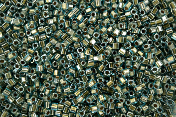 10g TOHO 1,5mm Würfel japanische Rocailles 990 Gold gefüttert Aqua