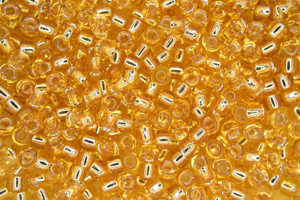 10g TOHO 6/0 Round Japanese Seed Beads 4mm PF22 PermaFinish Silver Lined Light Topaz