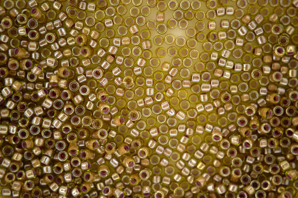 7g TOHO 11/0 Cylinder Treasure Japanese Seed Beads 1.8mm 1042 Orange Lined Light Peridot