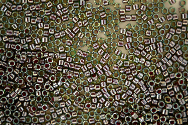 7g TOHO 11/0 Cylinder Treasure Japanese Seed Beads 1.8mm 1043 Brick Lined Light Peridot